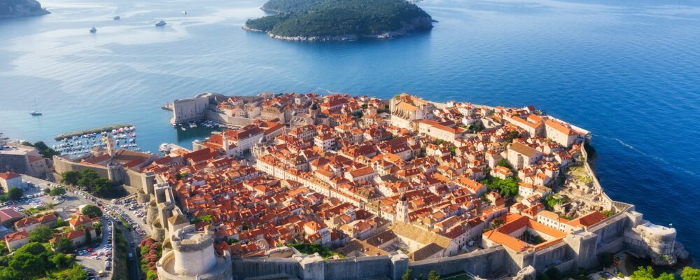 Dudrovnik, Croatia. Aerial view on the old town. Vacation and adventure. Town and sea. Top view from drone at on the old castle and azure sea. Travel - image